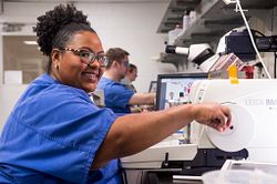 Toxicologist working in a lab.