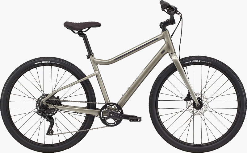 A modern bicycle with a sleek design, featuring a metallic frame, wide tires, and disc brakes, suitable for various terrains.