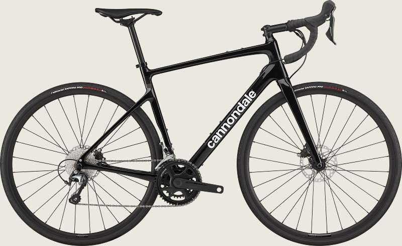 Brown Cannondale Synapse Carbon 4 carbon road bike with Shimano Tiagra groupset and hydraulic disc brakes.