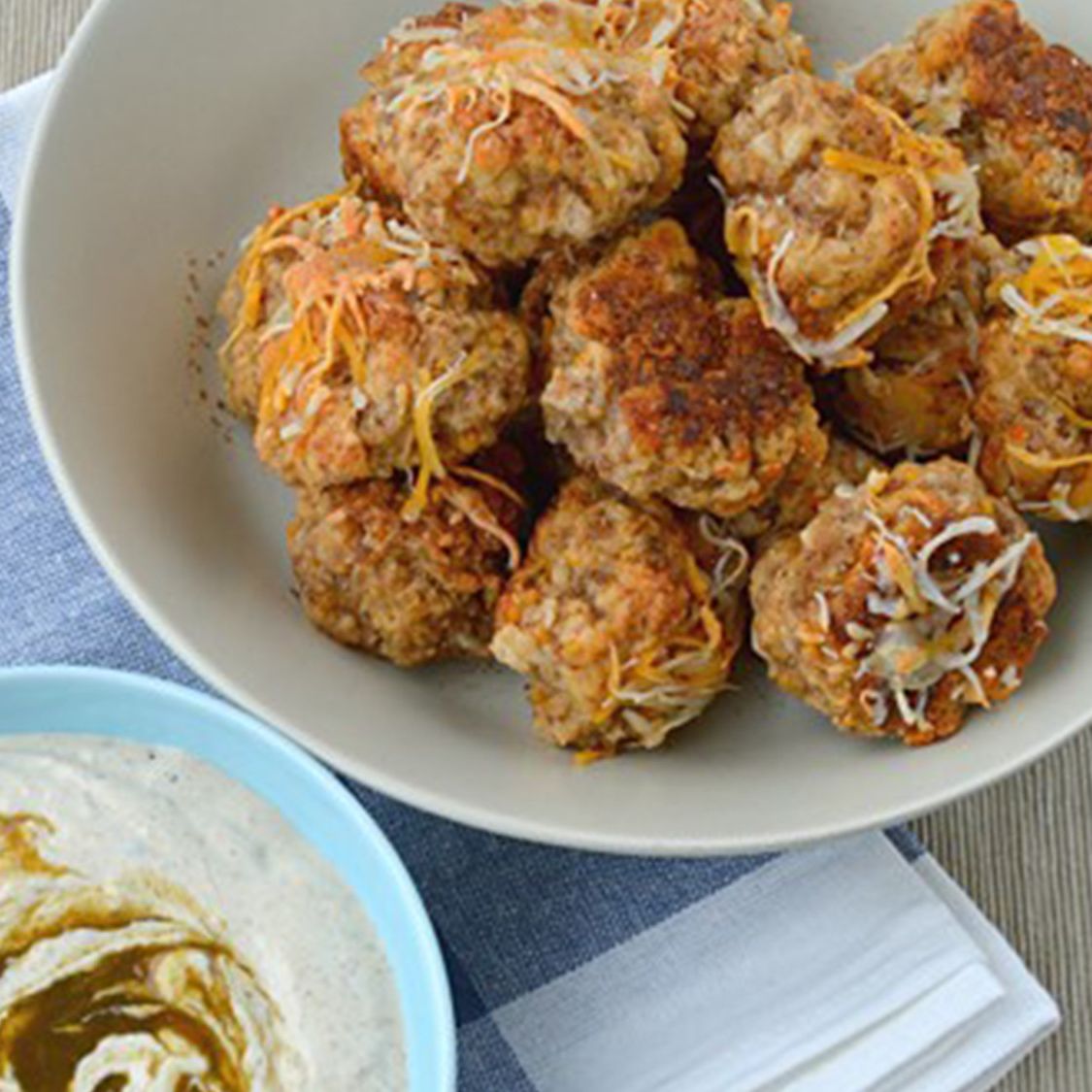 Spiced Sausage & Cheese Balls with Creamy Green Chile Dip Stubb's BBQ