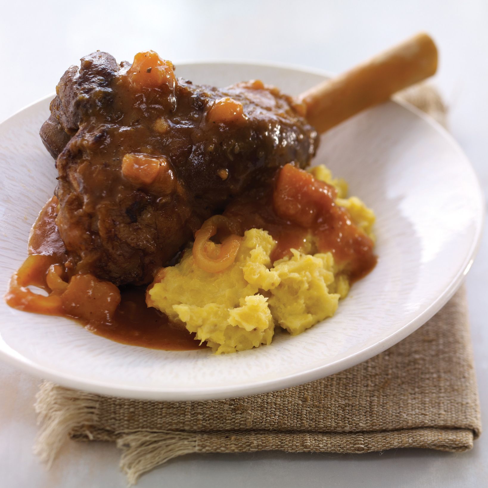 CinnamonBraised Lamb Shanks with Mashed Plantains HelloFlavour.ca