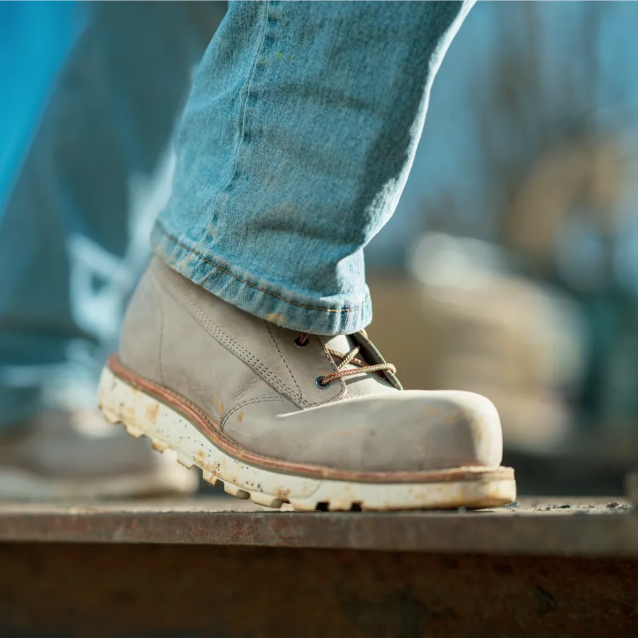 Closeup of person's lower leg with a boot on