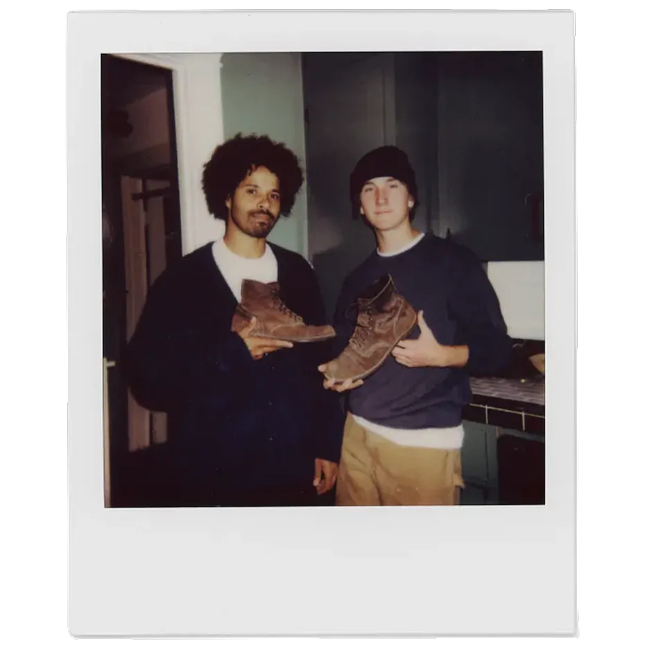 Brelan and Max holding Red Wing Boots
