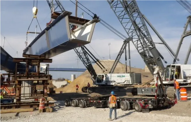 Construction site with workers using large equipment