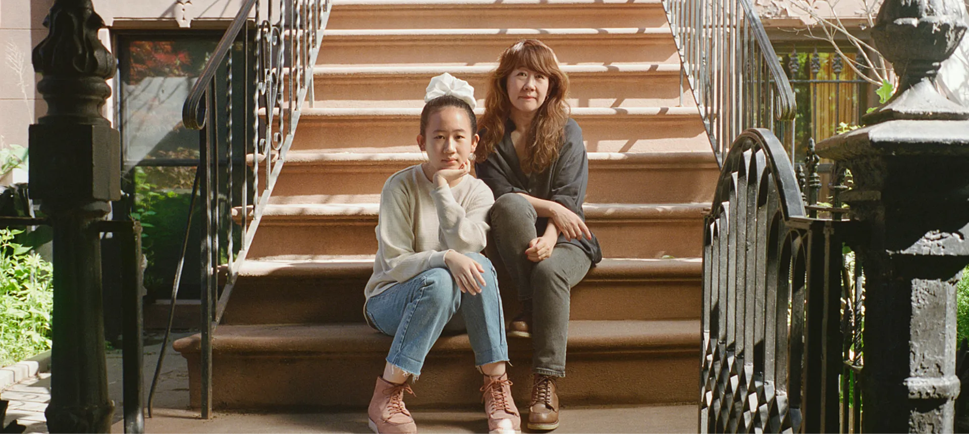 Yuki + Shino, mother and daughter, sitting on a staircase
