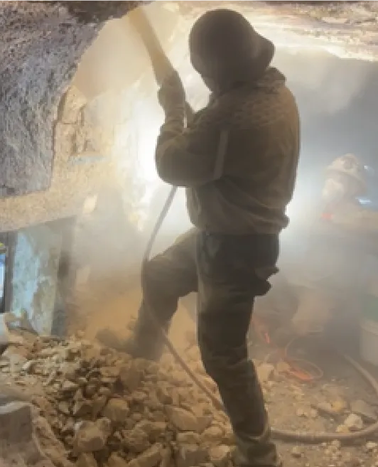 Nick Petito working in a dusty jobsite