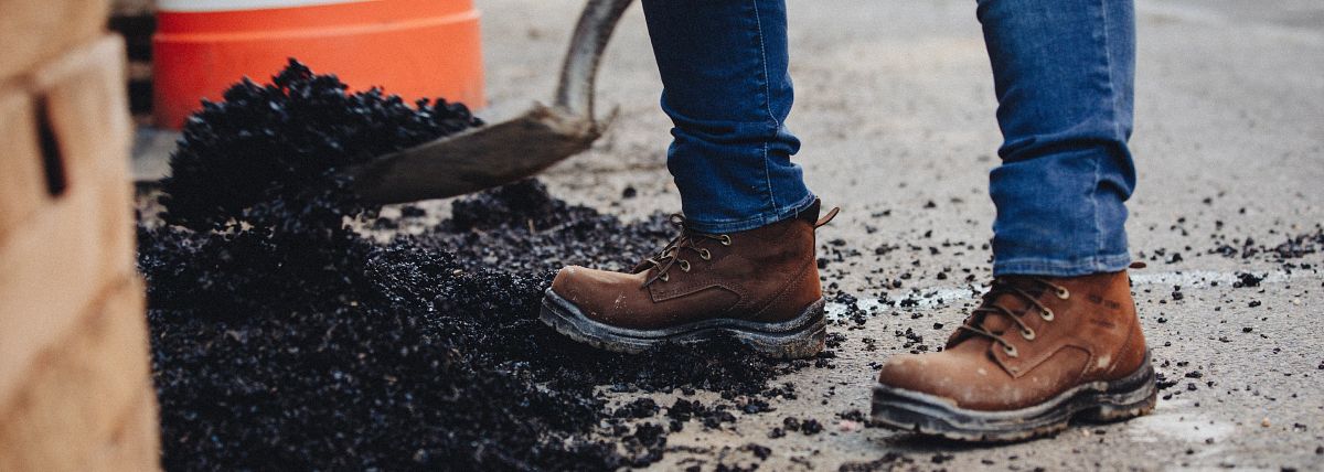 Construction worker wearing King Toe boots