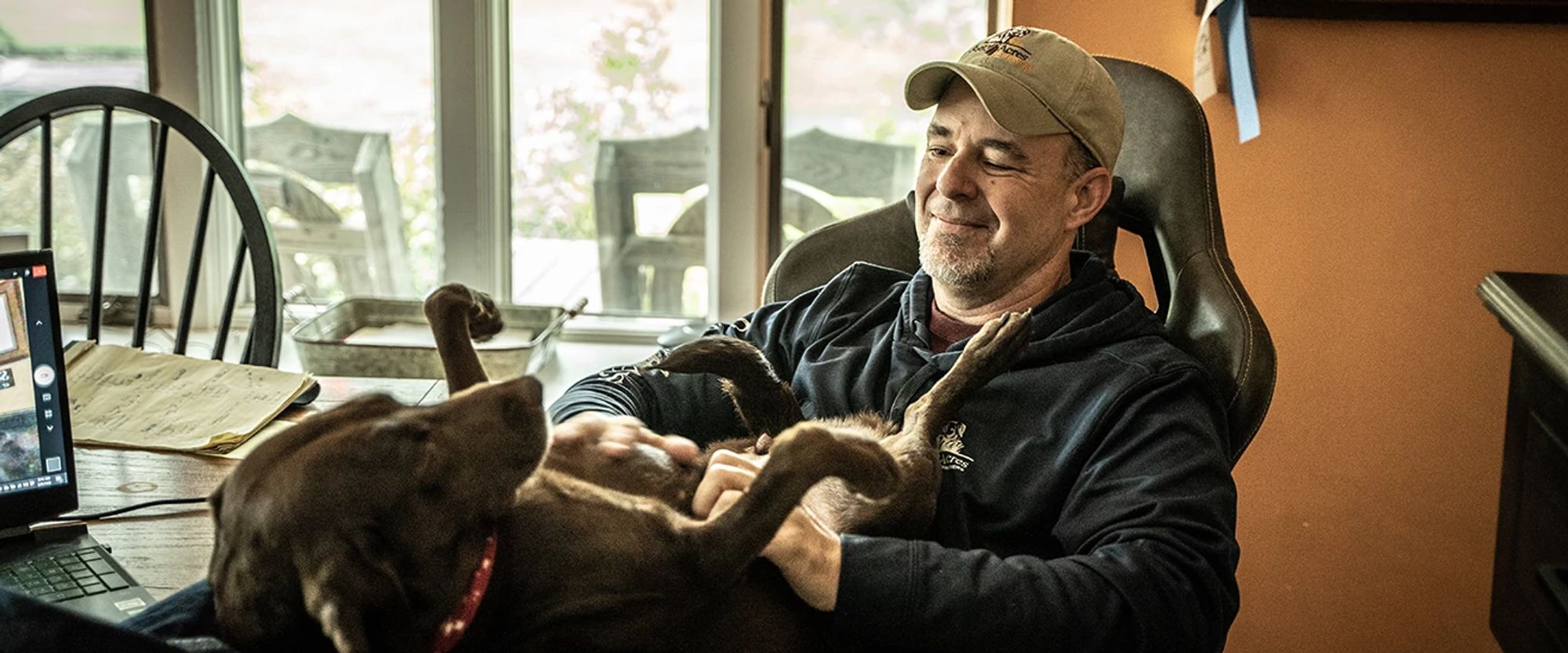 Jeff Fuller with dog at home