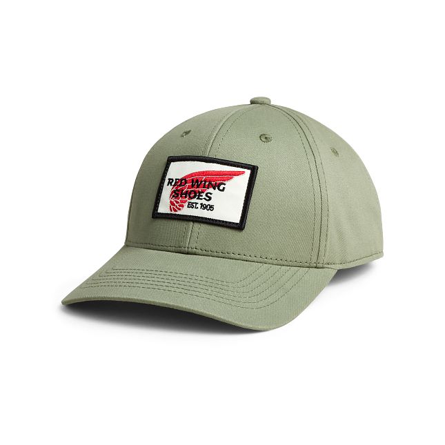 Red and store green baseball caps