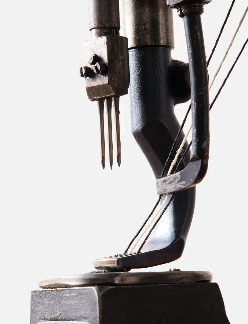 Close up view of the needles of the Puritan sewing machine 