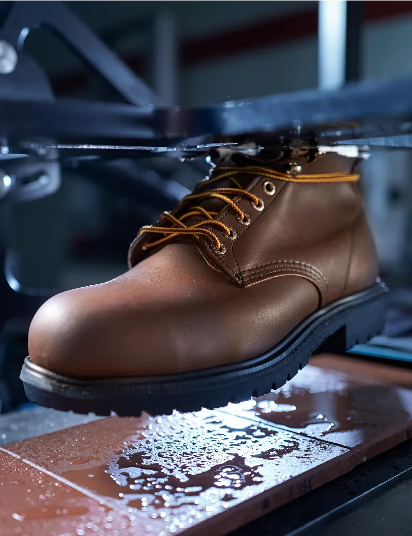 Close up of a boot being made on a machine