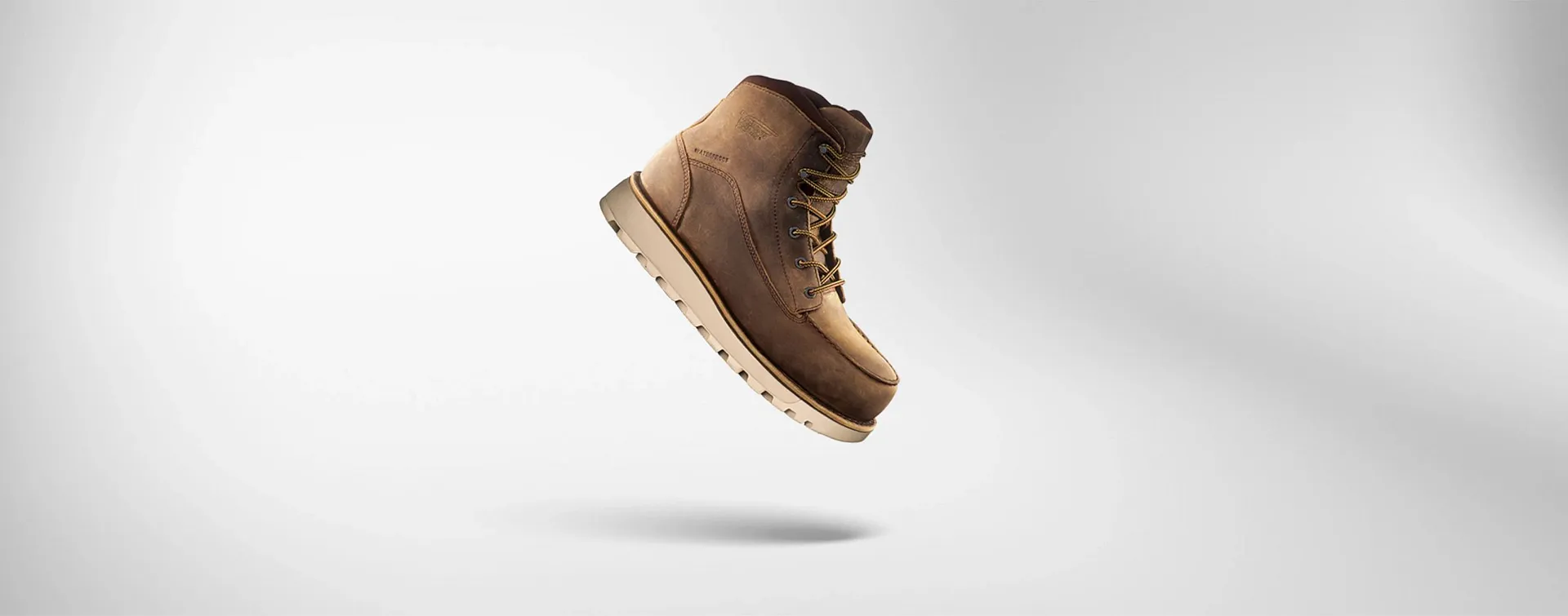 Traction Lite boot floating against a white background