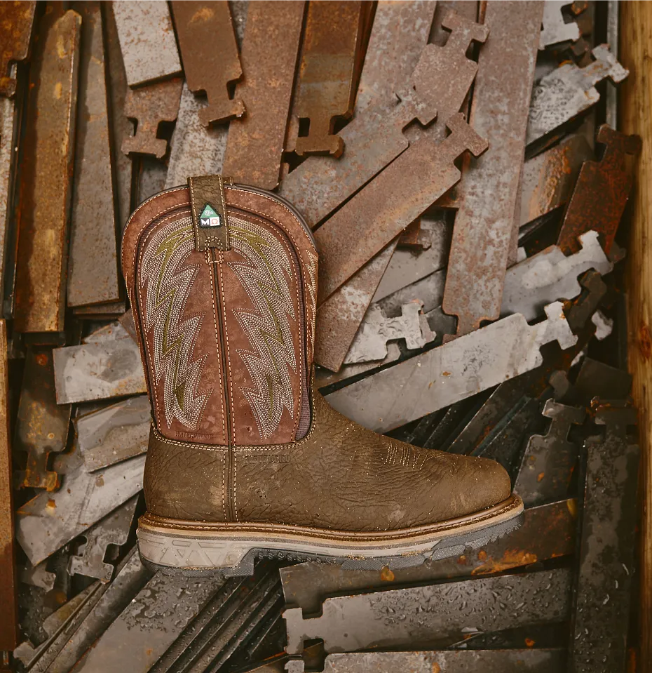 One Rio Flex boot against a background of metal pieces