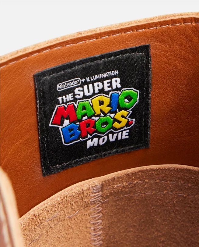 Boot tongue showing Mario Brothers stitched logo