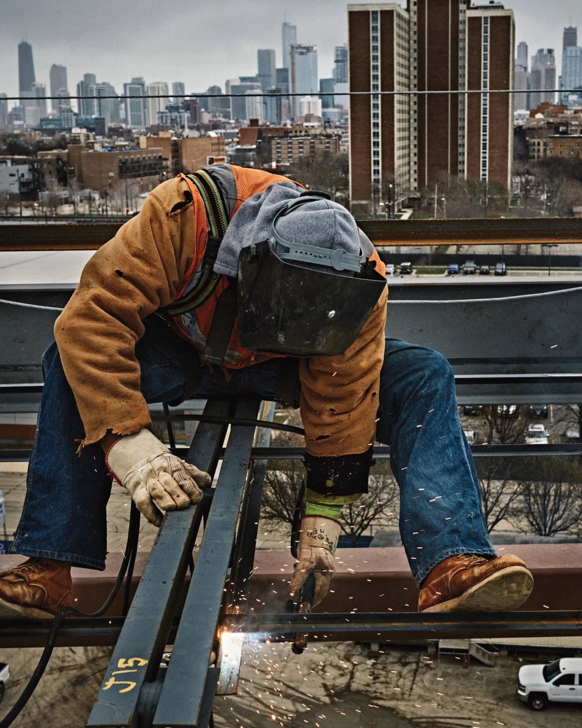 Construction working on beam wearing Red Wing Traction boots