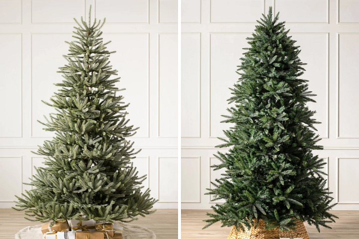 two unlit artificial Christmas trees