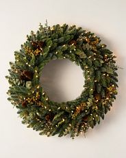 decorated greenery wreath with clear lights