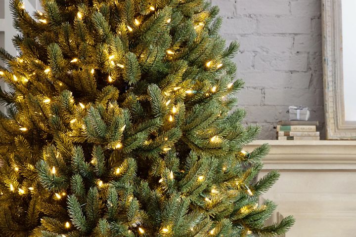 realistic artificial Christmas tree with clear LED lights