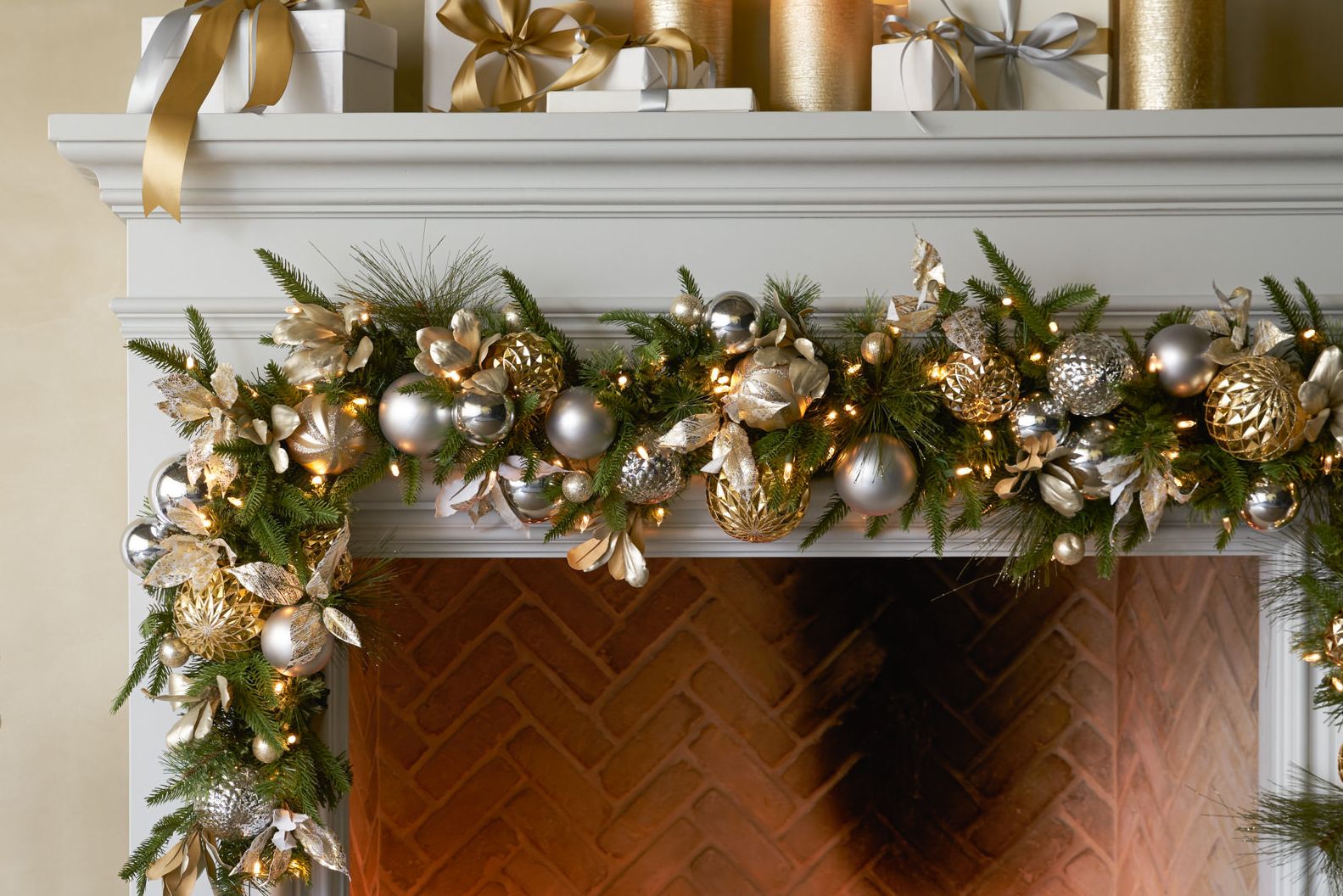 Greenery garland with silver and gold Christmas ornaments