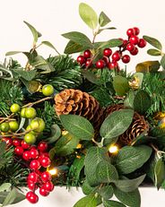 close-up of traditional greenery needles and accents