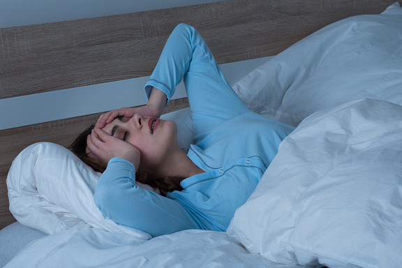 woman having trouble sleeping