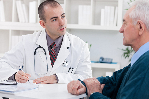 older man at doctor consultation
