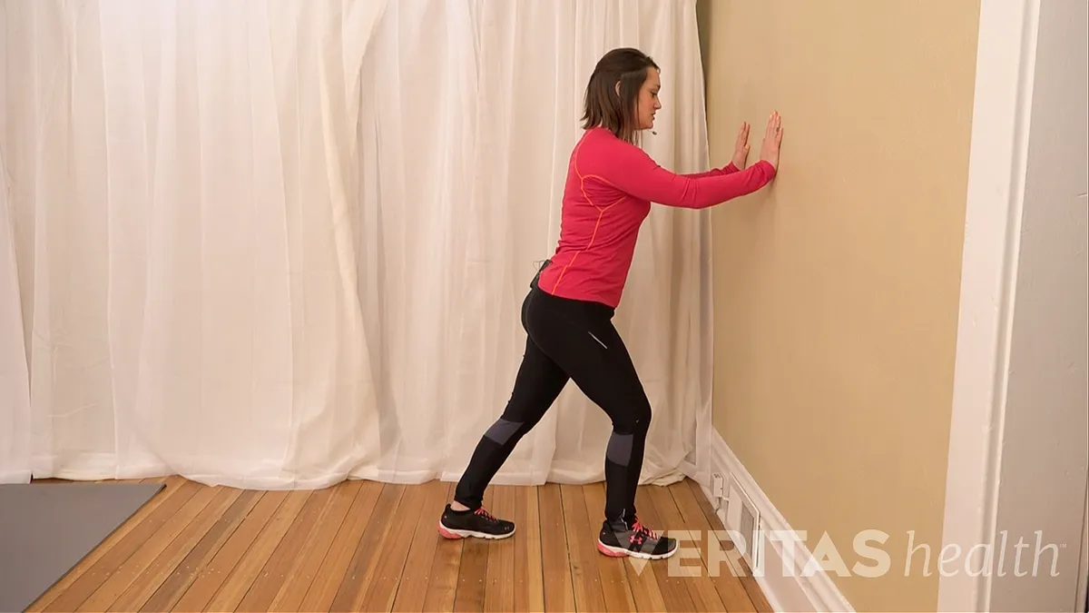 Stretch Tutorial: Standing Calf Stretch On Wall 