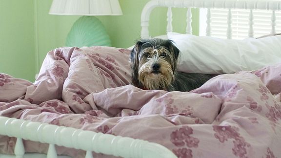 For better sleep, keep your room cool and pile on the blankets.