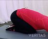 Woman performing a four point back flexion.
