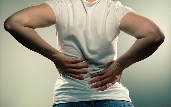 woman experiencing lower back pain