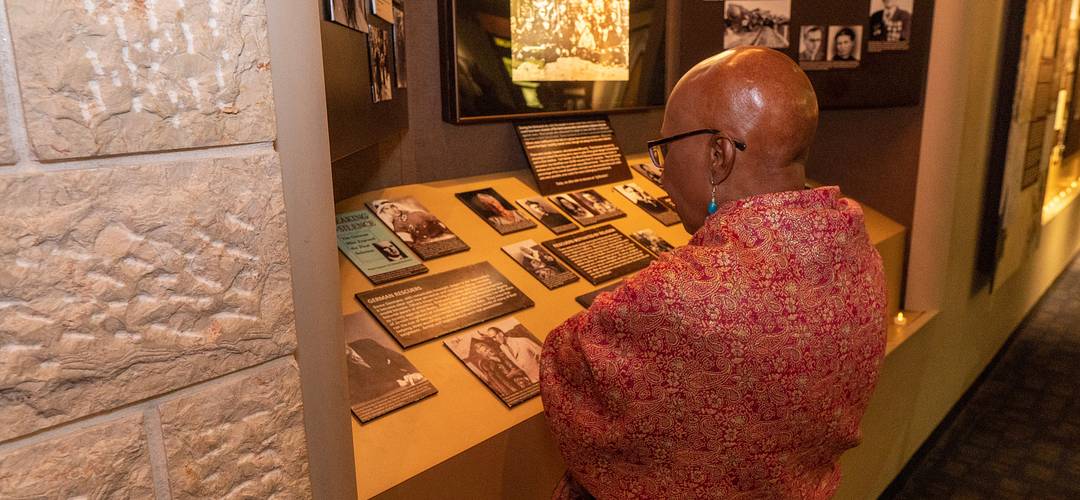 The Holocaust Memorial Resource and Education Center A visitor at the Holocaust Memorial Resource and Education Center of Florida viewing an exhibit