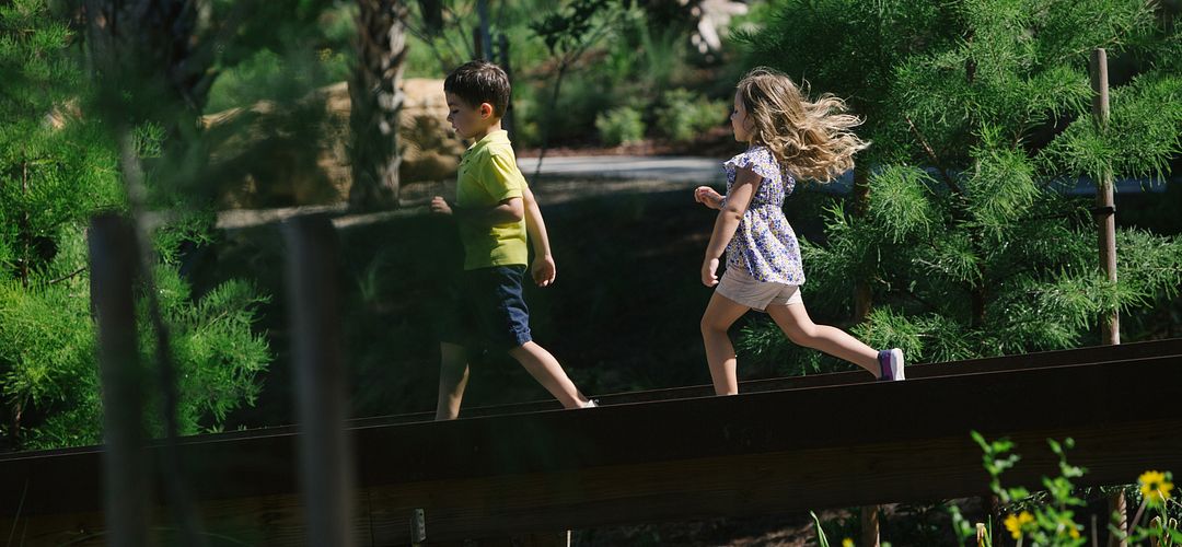 Bok Tower Children's Garden Children running on the playground in the Bok Tower Children's Garden