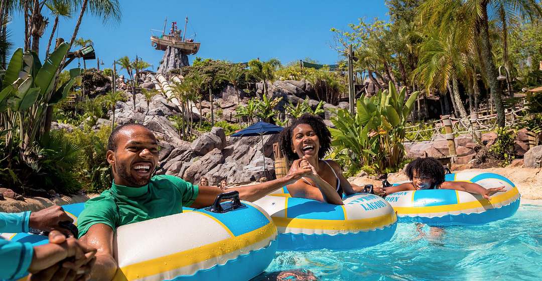 Disney's Typhoon Lagoon Water Park Family on water floats at Disney's Typhoon Lagoon Water Park