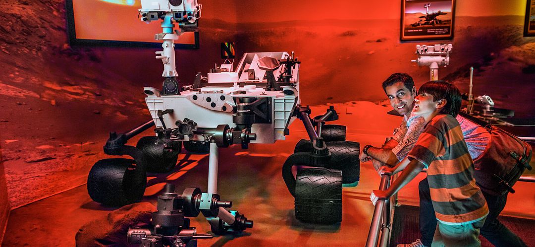 Mars Rover at Kennedy Space Center A father and son admiring the Mars Rover on display at Kennedy Space Center