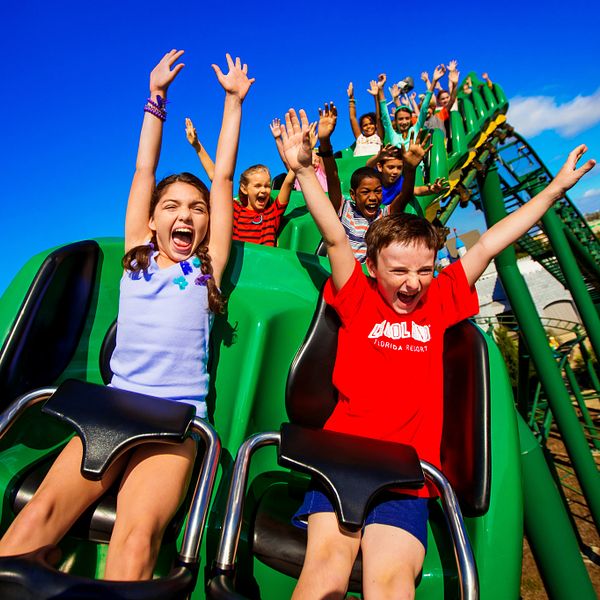 Children on LEGOLAND® Florida Resort Dragon Ride coaster