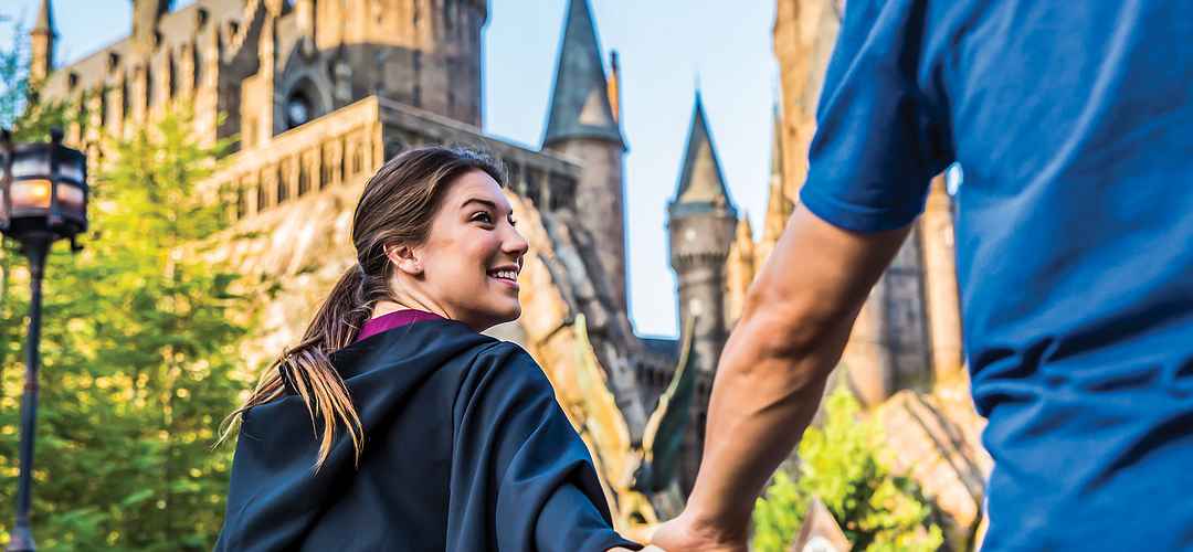 Wizarding World of Harry Potter, Hogsmeade at Island of Adventure Couple holding hands in Hogsmeade at the Wizarding World of Harry Potter