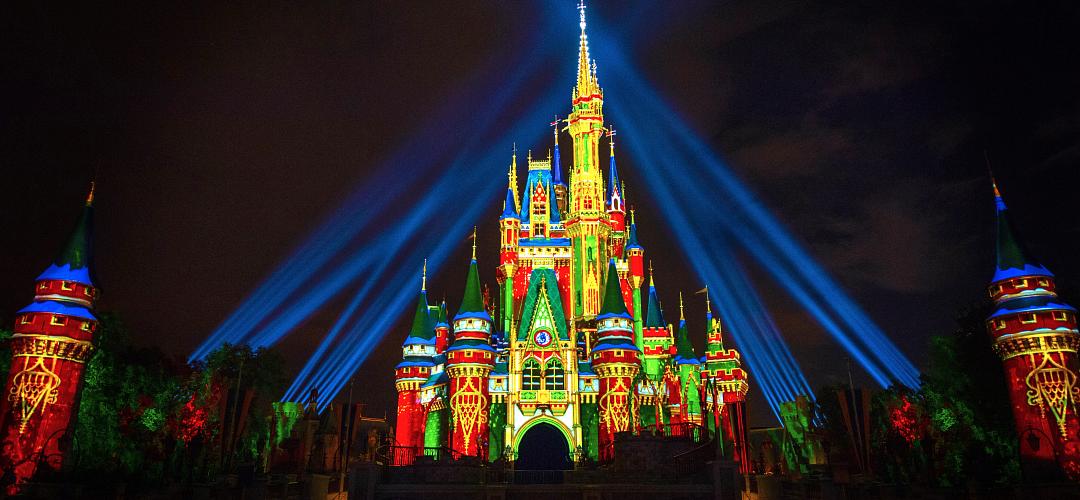 Holiday lights at Cinderella Castle A nighttime shot of holiday projections on the Cinderella Castle inside the Magic Kingdom