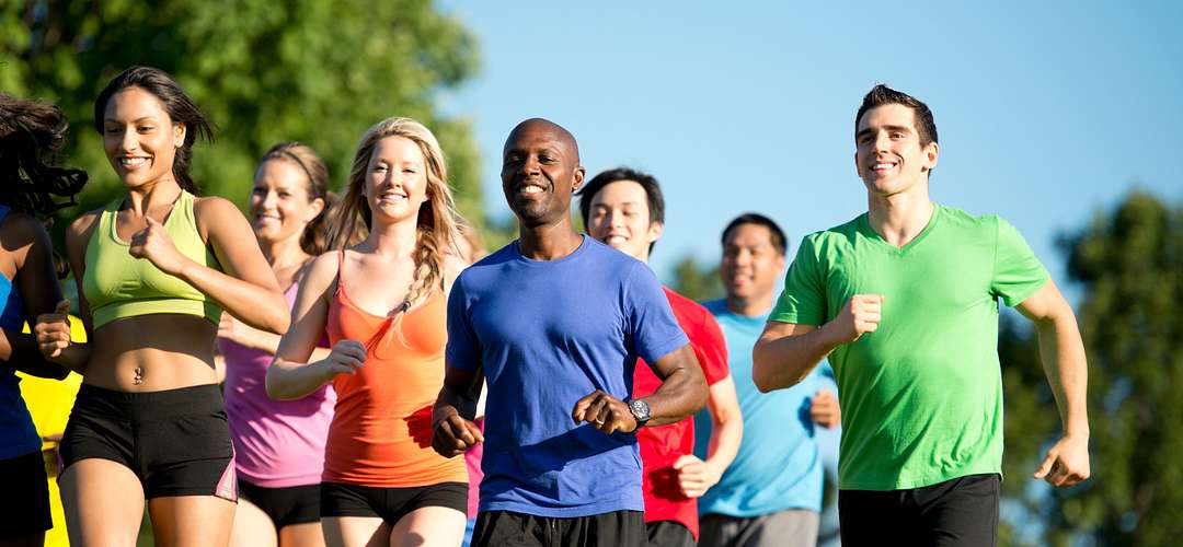 Orlando Running running run jog jogging 5k 10k marathon race racing caucasian african america blue sky trees male female men women horizontal fitness exercise health healthy lifestyle cross country group