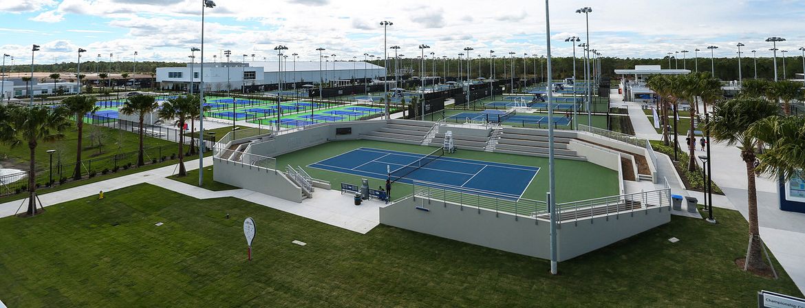 An elevated view of several of the tennis courts at the USTA campus