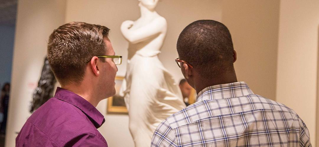 Orlando Museum of Art Two men looking at a sculpture at the Orlando Museum of Art