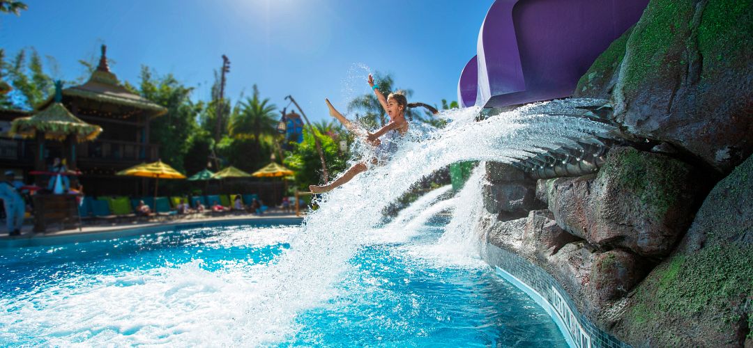 Universal's Volcano Bay A little girl coming out of a water slide in Universal's Volcano Bay.