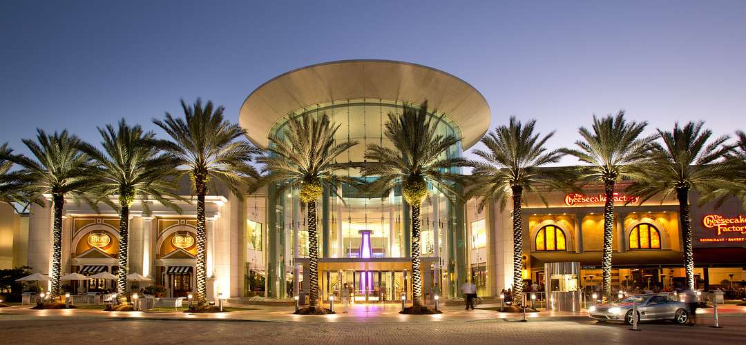 The Mall at Millenia An exterior shot of the main entrance of The Mall at Millenia in Orlando at night