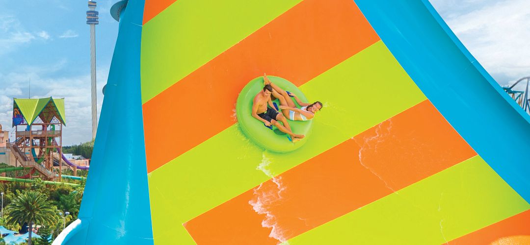 SeaWorld's Aquatica A couple on the KareKare Curl water slide at Aquatica