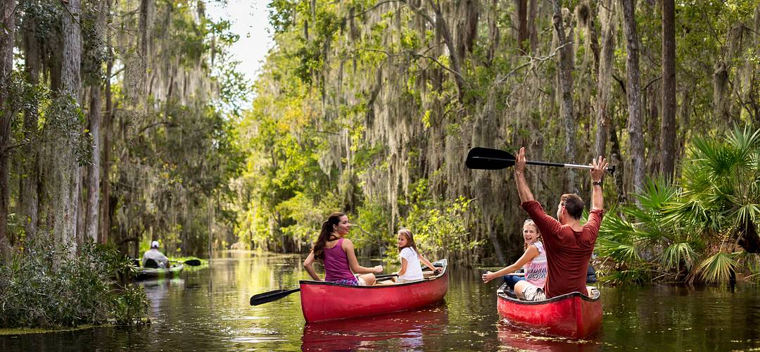 Guided eco-tours through the JW Marriott Orlando, Grande Lakes A family on a guided canoe tour through Shingle Creek in Orlando