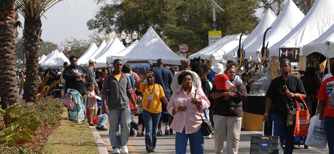 Eatonville Outdoor Festival A crowd moves through the Outdoor Festival of the Arts in Historic Eatonville