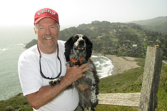 David Gjestson holding his dog