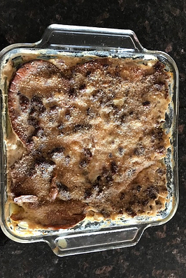 A casserole dish filled with venison moussaka