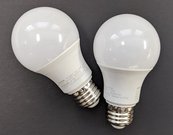 two compact fluorescent light bulbs