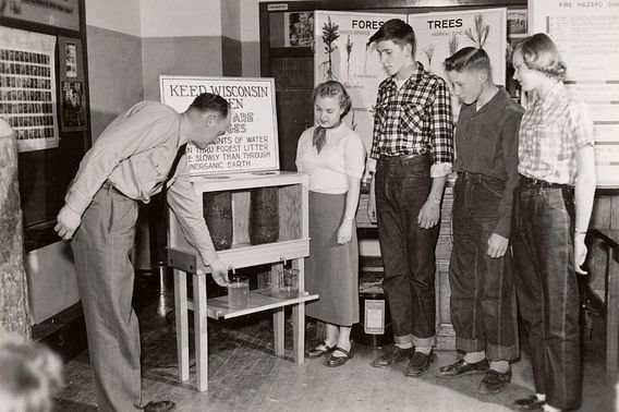 teenagers at school in 1952 with Conservation Department forester H.J. Hovind