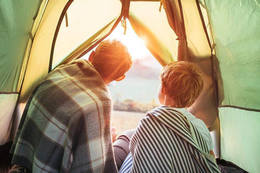 Father and Son-meet-a-sunset-in-mountain,-look-out from-tent-1057570240_3600x2400.jpeg